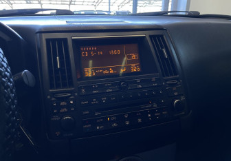 Подержанный автомобиль Infiniti FX 2003 года (13 фото)