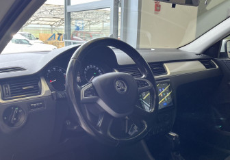 Подержанный автомобиль Skoda Rapid Liftback 2015 года (7 фото)