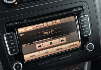 Подержанный автомобиль Volkswagen Touran 2011 года (14 фото)