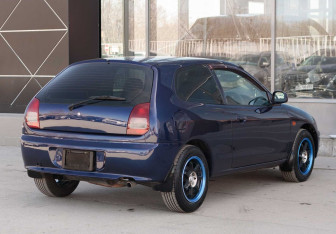 Подержанный автомобиль Mitsubishi Mirage Hatchback 1997 года (5 фото)