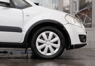 Подержанный автомобиль Suzuki SX4 Sedan 2013 года (9 фото)