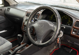 Подержанный автомобиль Toyota Carina Sedan 1999 года (11 фото)