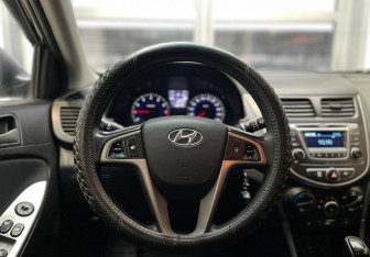 Подержанный автомобиль Hyundai Solaris Sedan 2015 года (13 фото)