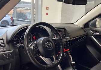 Подержанный автомобиль Mazda CX-5 2011 года (10 фото)