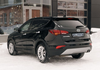 Подержанный автомобиль Hyundai Santa Fe 2016 года (7 фото)
