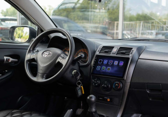 Подержанный автомобиль Toyota Corolla Sedan 2007 года (10 фото)