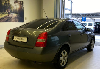 Подержанный автомобиль Nissan Primera Sedan 2003 года (4 фото)