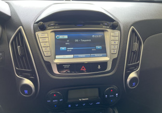 Подержанный автомобиль Hyundai ix35 2012 года (8 фото)