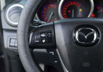 Подержанный автомобиль Mazda CX-7 2011 года (12 фото)