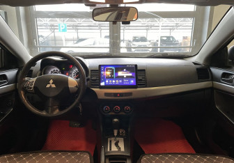 Подержанный автомобиль Mitsubishi Lancer Sedan 2013 года (15 фото)