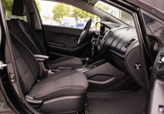 Подержанный автомобиль Kia Cerato Sedan 2013 года (19 фото)