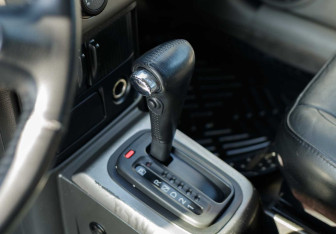 Подержанный автомобиль Nissan X-Trail 2004 года (14 фото)