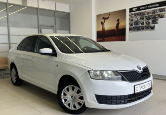 Подержанный автомобиль Skoda Rapid Liftback 2015 года (3 фото)