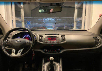 Подержанный автомобиль Kia Sportage 2012 года (9 фото)