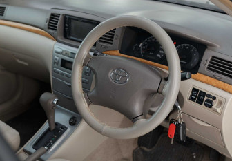 Подержанный автомобиль Toyota Corolla Sedan 2004 года (11 фото)