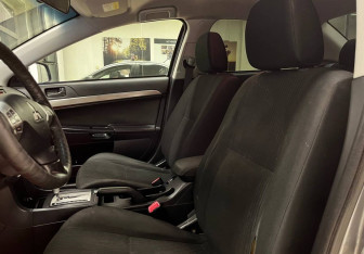Подержанный автомобиль Mitsubishi Lancer Sedan 2013 года (14 фото)