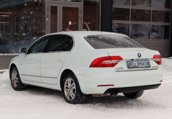 Подержанный автомобиль Skoda Superb Liftback 2014 года (7 фото)