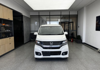 Подержанный автомобиль Honda N-WGN 2014 года (2 фото)