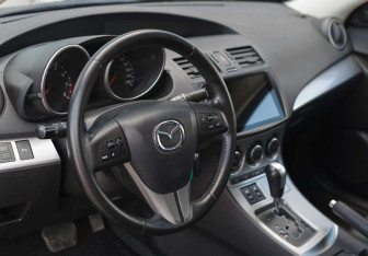 Подержанный автомобиль Mazda 3 Sedan 2009 года (11 фото)