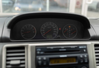 Подержанный автомобиль Nissan X-Trail 2005 года (13 фото)