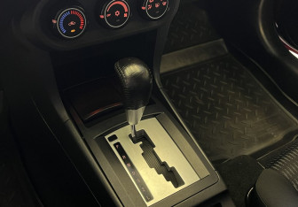 Подержанный автомобиль Mitsubishi Lancer Sedan 2011 года (11 фото)