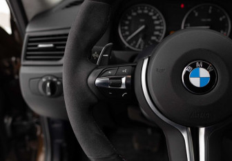 Подержанный автомобиль BMW X1 2011 года (12 фото)