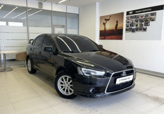Подержанный автомобиль Mitsubishi Lancer Sedan 2013 года (4 фото)