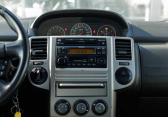Подержанный автомобиль Nissan X-Trail 2004 года (13 фото)