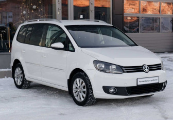 Подержанный автомобиль Volkswagen Touran 2011 года (3 фото)