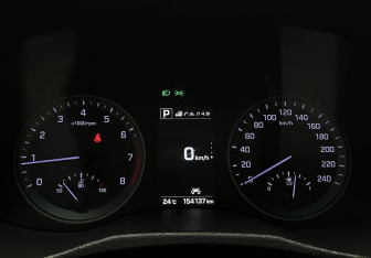 Подержанный автомобиль Hyundai Tucson 2015 года (11 фото)