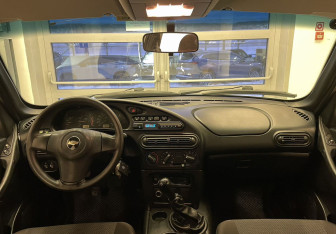 Подержанный автомобиль Chevrolet Niva 2011 года (11 фото)