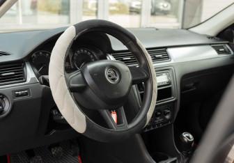 Подержанный автомобиль Skoda Rapid Liftback 2017 года (11 фото)