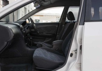 Подержанный автомобиль Nissan Wingroad 2000 года (17 фото)