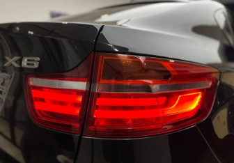 Подержанный автомобиль BMW X6 2013 года (7 фото)