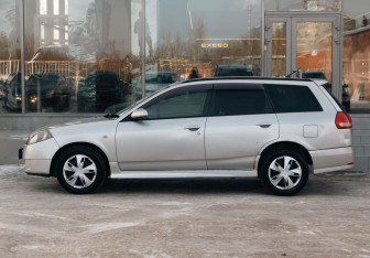 Подержанный автомобиль Nissan Wingroad 2002 года (8 фото)