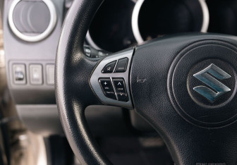 Подержанный автомобиль Suzuki Grand Vitara 2010 года (12 фото)