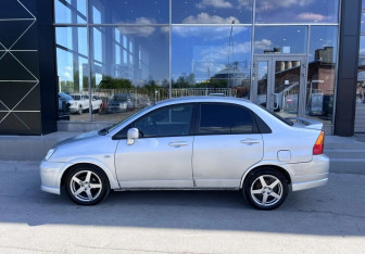 Подержанный автомобиль Suzuki Aerio Sedan 2003 года (8 фото)