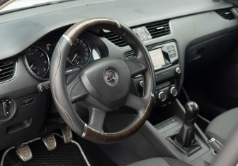 Подержанный автомобиль Skoda Octavia Liftback 2015 года (11 фото)