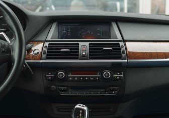 Подержанный автомобиль BMW X6 2011 года (14 фото)