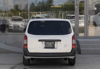 Подержанный автомобиль Toyota Probox 2009 года (6 фото)