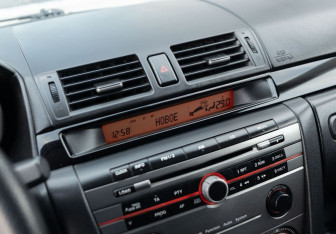 Подержанный автомобиль Mazda 3 Sedan 2006 года (14 фото)