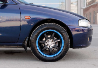 Подержанный автомобиль Mitsubishi Mirage Hatchback 1997 года (8 фото)