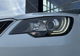 Подержанный автомобиль Skoda Superb Liftback 2014 года (13 фото)