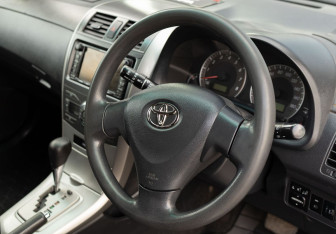 Подержанный автомобиль Toyota Corolla Wagon 2007 года (11 фото)