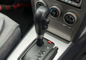 Подержанный автомобиль Nissan Wingroad 2002 года (13 фото)