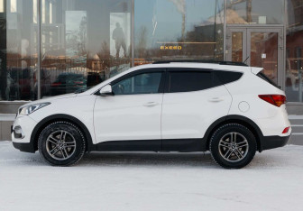 Подержанный автомобиль Hyundai Santa Fe 2016 года (8 фото)