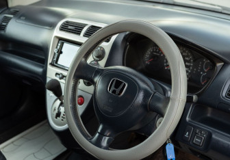 Подержанный автомобиль Honda Civic Hatchback 2001 года (11 фото)