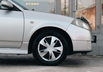 Подержанный автомобиль Nissan Wingroad 2002 года (9 фото)