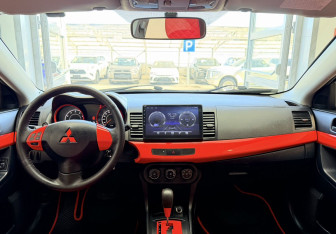 Подержанный автомобиль Mitsubishi Lancer Sedan 2012 года (13 фото)