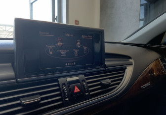 Подержанный автомобиль Audi A7 2010 года (11 фото)